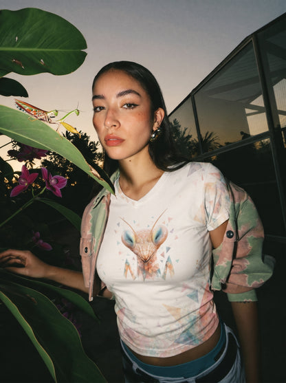 Model wearing the SilverWEAR mantis women’s T-shirt in a dark editorial setting.