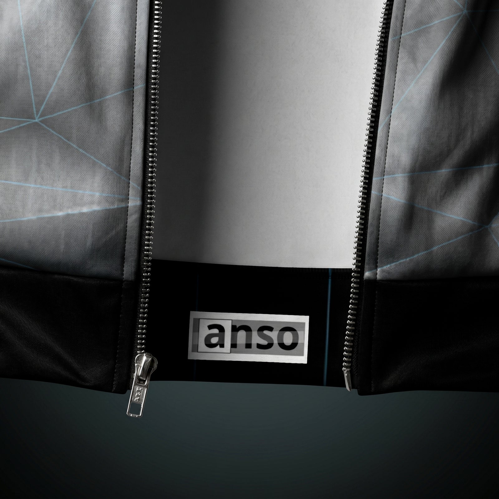 Close-up of a jacket with a zipper and 'anso' brand logo on a white background