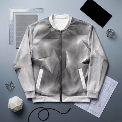 Gray geometric-patterned jacket on a gray background with design tools.