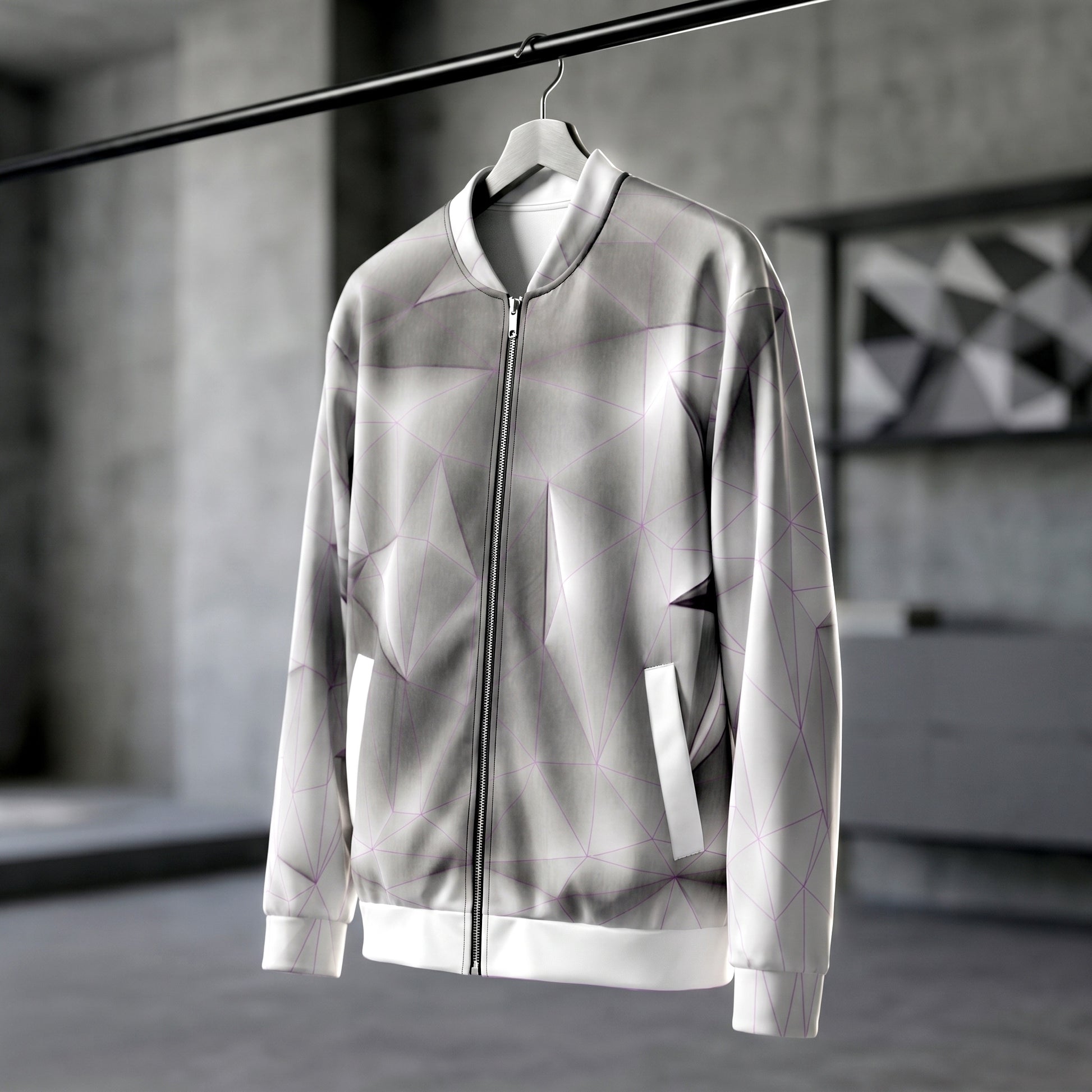 Silver reflective jacket on a hanger against a blurred indoor background