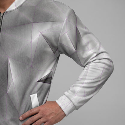 Geometric patterned jacket on a gray background