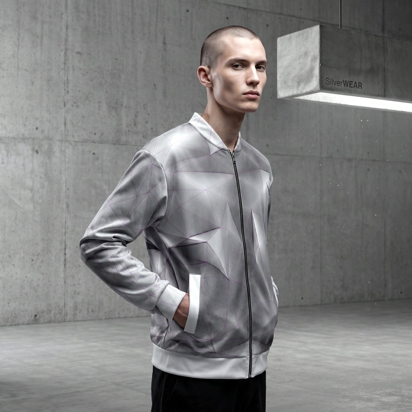 Man wearing a gray and white jacket in an urban setting