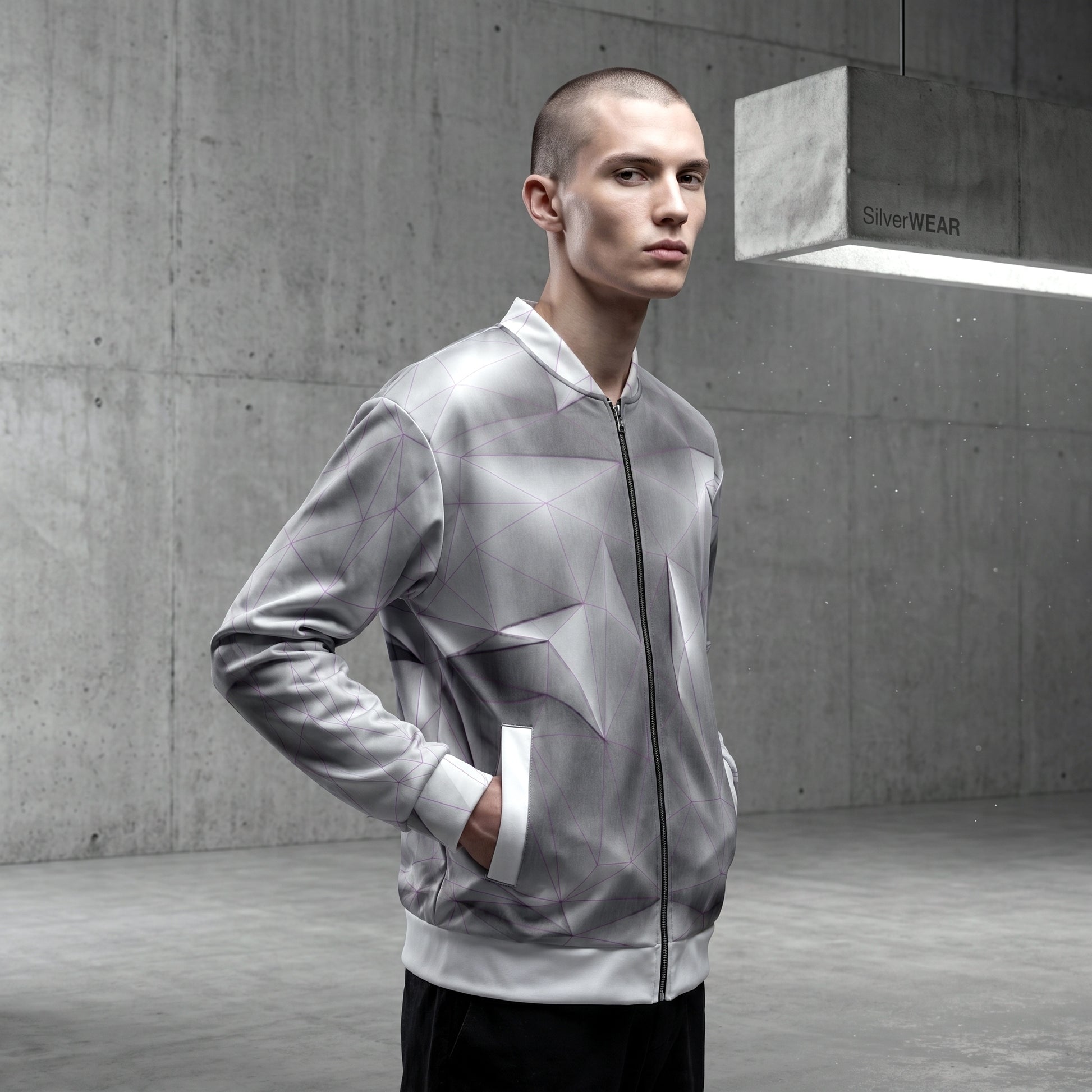 Man wearing a gray and white jacket in an urban setting