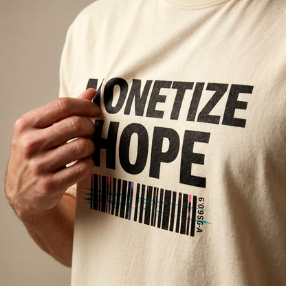 Beige t-shirt with 'MONETIZE HOPE' text and barcode design.