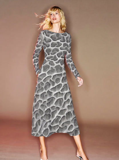 Editorial fashion image of a model wearing the ANSO Cellular Mesh Midi Dress against a warm neutral studio background, showing the long sleeves, flared midi skirt, and sculptural grey mesh print.