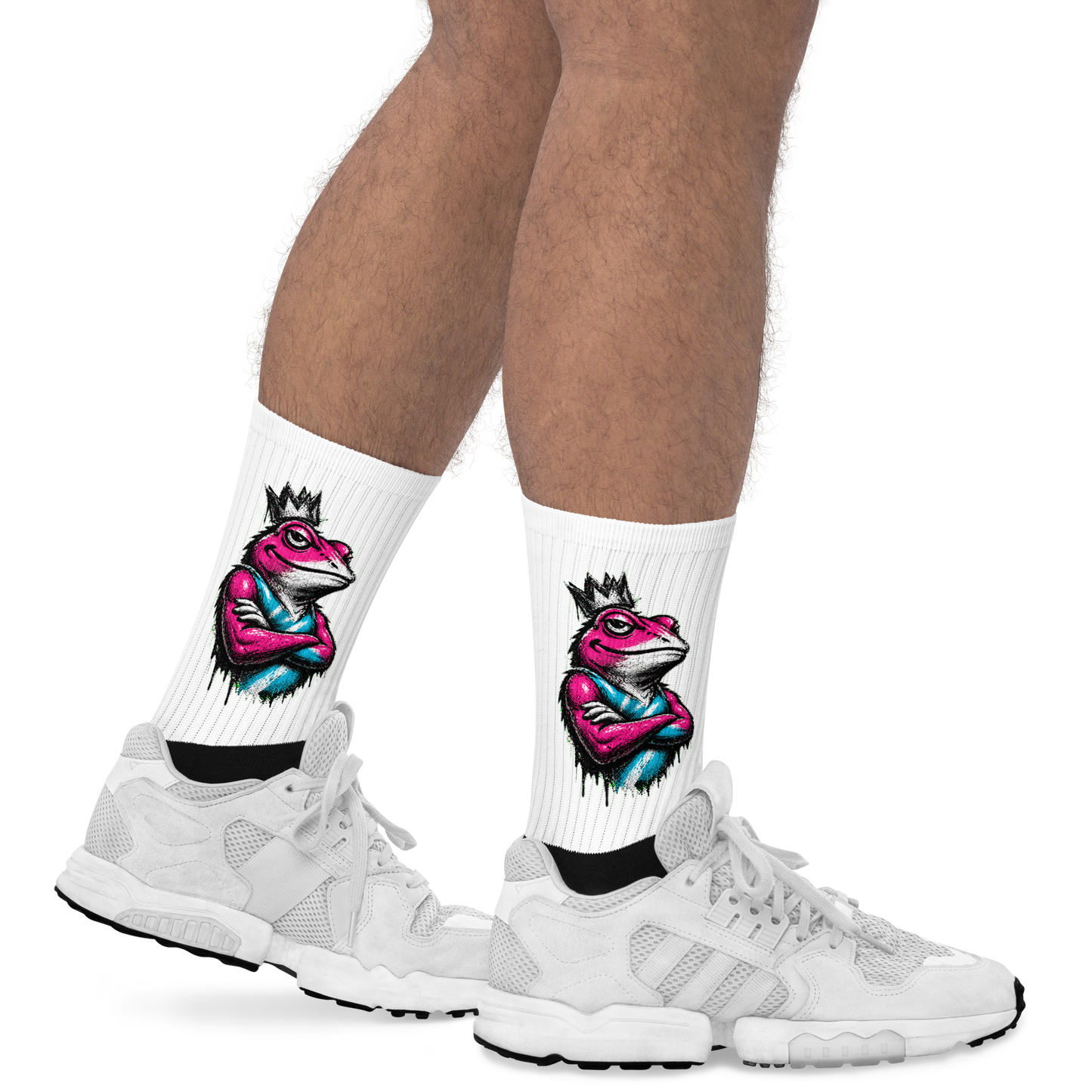 White socks with colorful frog design worn with white sneakers on a white background