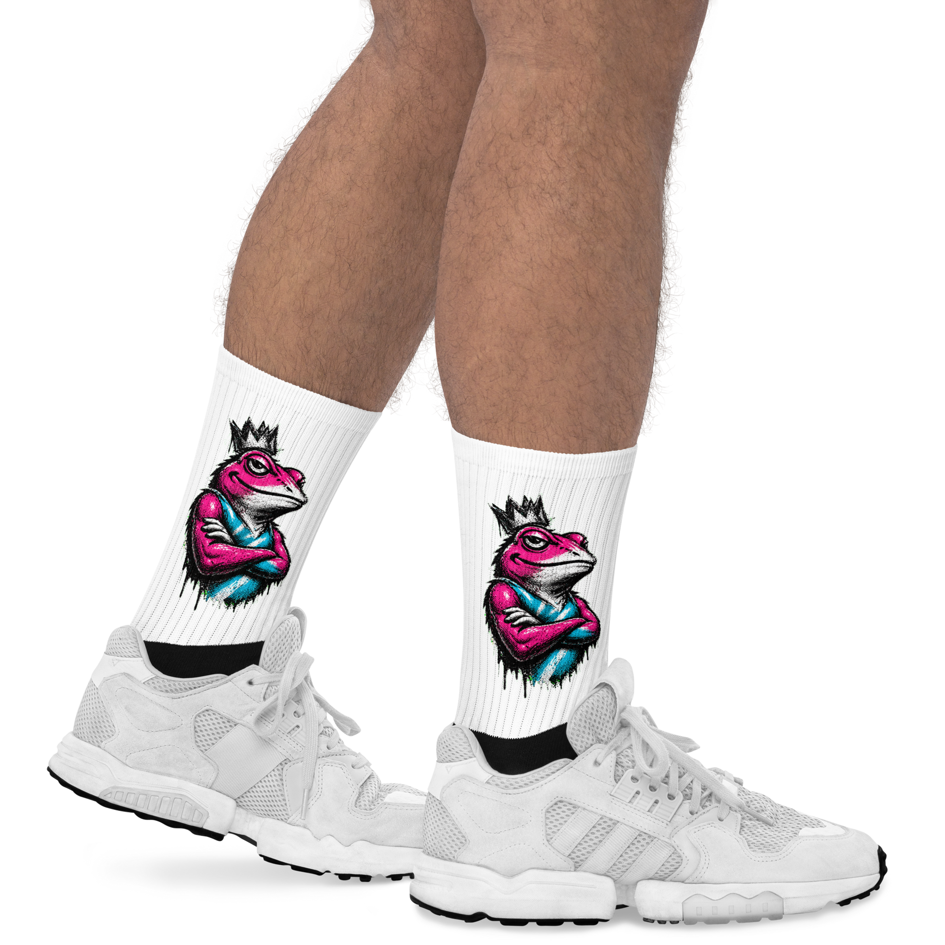 White socks with colorful frog design worn with white sneakers on a white background
