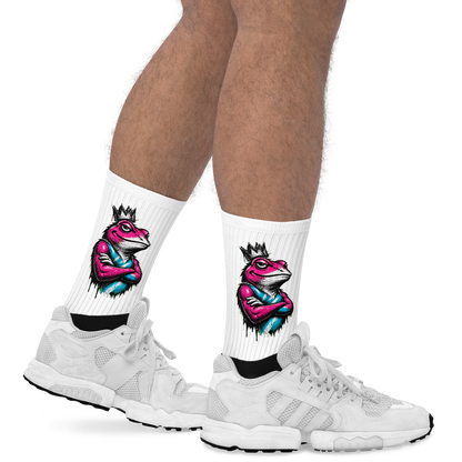 White socks with colorful frog design worn with white sneakers on a white background