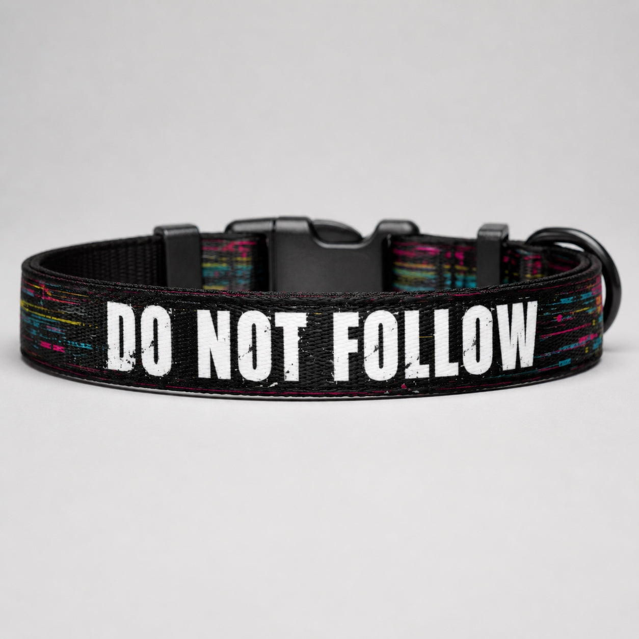 Dog collar with 'DO NOT FOLLOW' text on a gray background