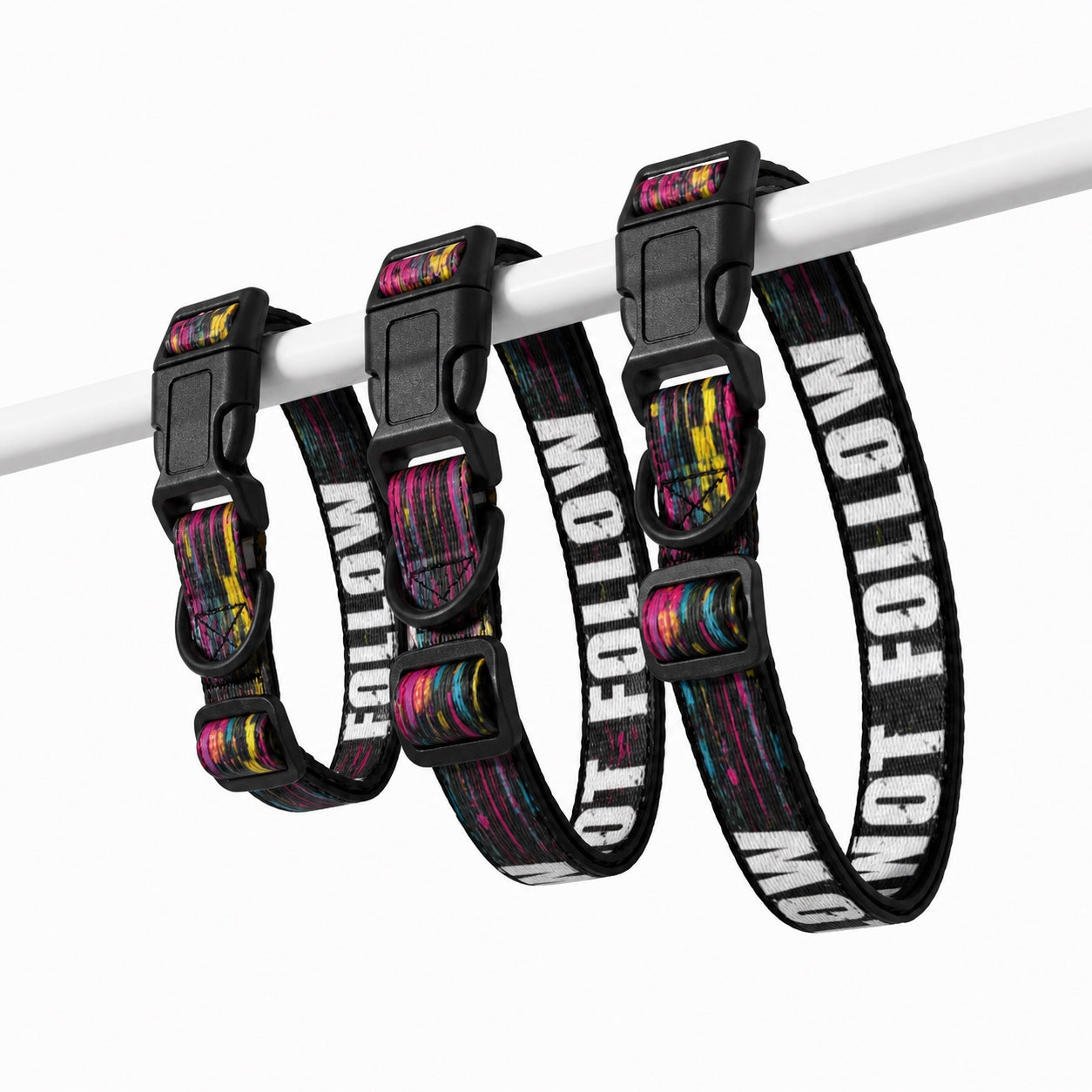 Set of colorful dog collars with 'Don't Follow' text on a white background