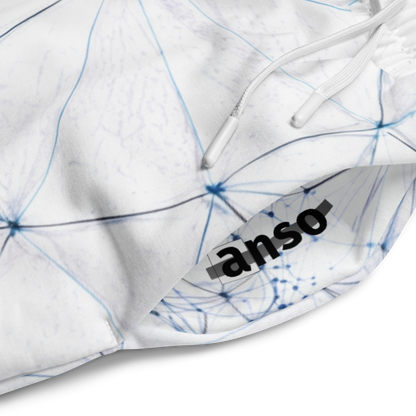 Close-up of a white hoodie with blue geometric patterns and 'anso' branding.