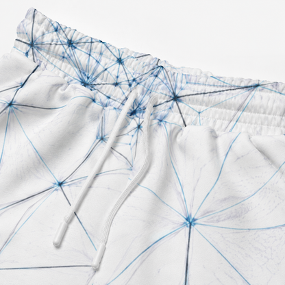 Elastic waistband and drawstring detail on ANSO all-over print wide-leg joggers.