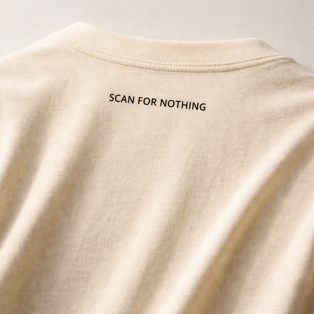Beige sweatshirt with 'SCAN FOR NOTHING' text on a light gray background